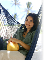 Pretty girl
enjoying the goodness of Coconuts